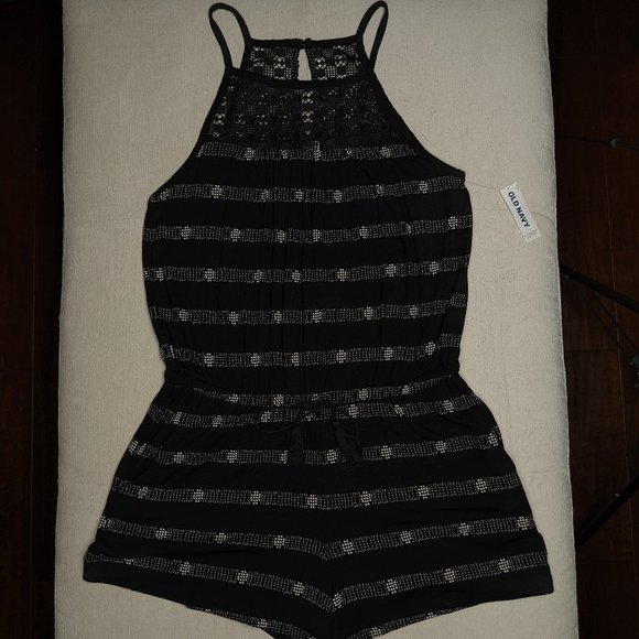 Black and white patterned romper with crochet detail yoke - Picture 1 of 6